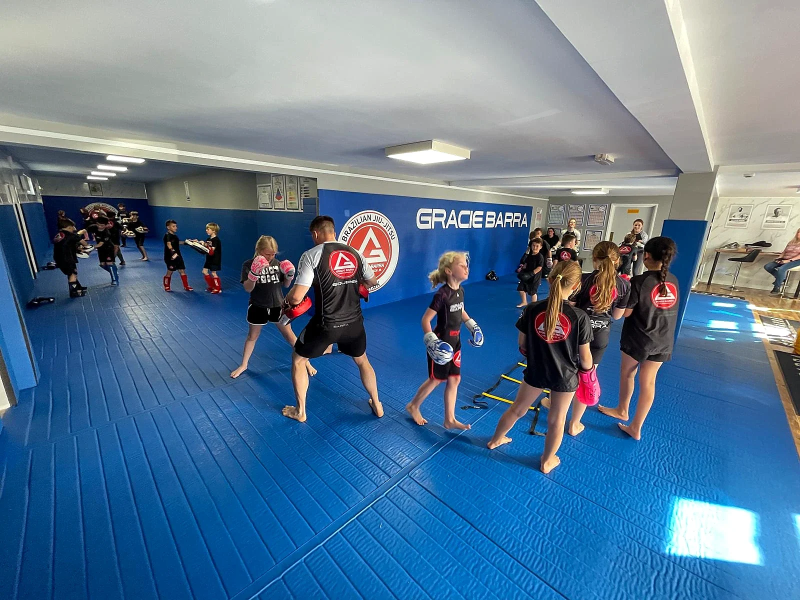 Youth striking class using the Gracie Barra Bath training floor